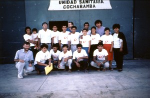 Dr. José Antonio Bastos (bottom left), poses with fellow MSF workers, during the training of health personnel during a cholera epidemic in Cochabamba, Bolivia, in 1992. © MSF