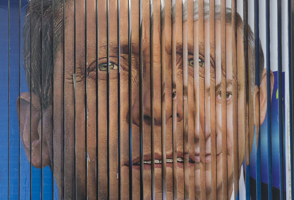 An election campaign billboard shifts between images of Israel’s Labour Party leader Isaac Herzog, left, and Likud Party leader and Israel’s Prime Minister Benjamin Netanyahu in Tel Aviv.