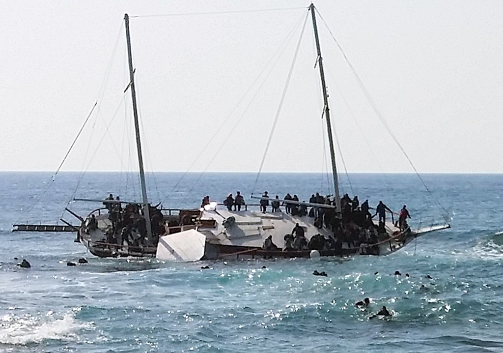 A migrant boat capsizes off the coast of the island of Rhodes, Greece.