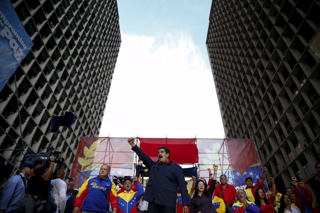 Venezuela's President Nicolás Maduro addresses a rally outside the National Electoral Council headquarters in Caracas.